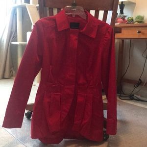 Waist length red raincoat